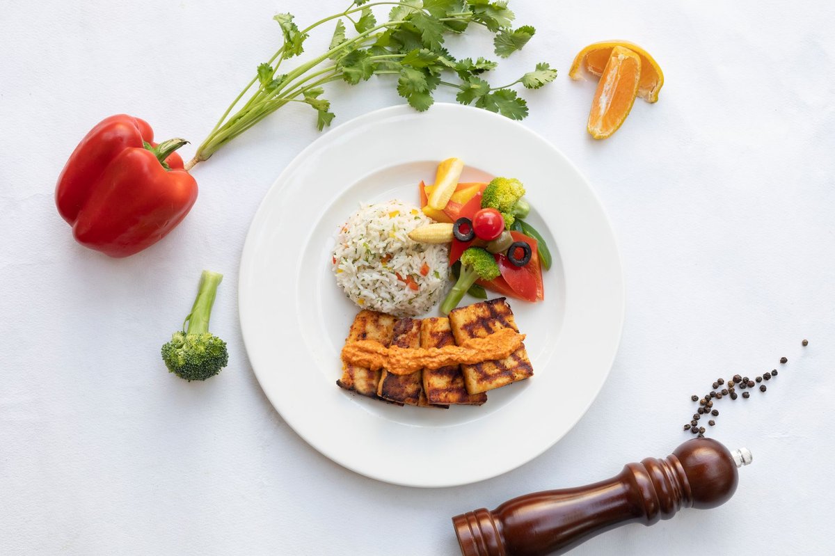 A balanced, healthy plate of food with vegetables