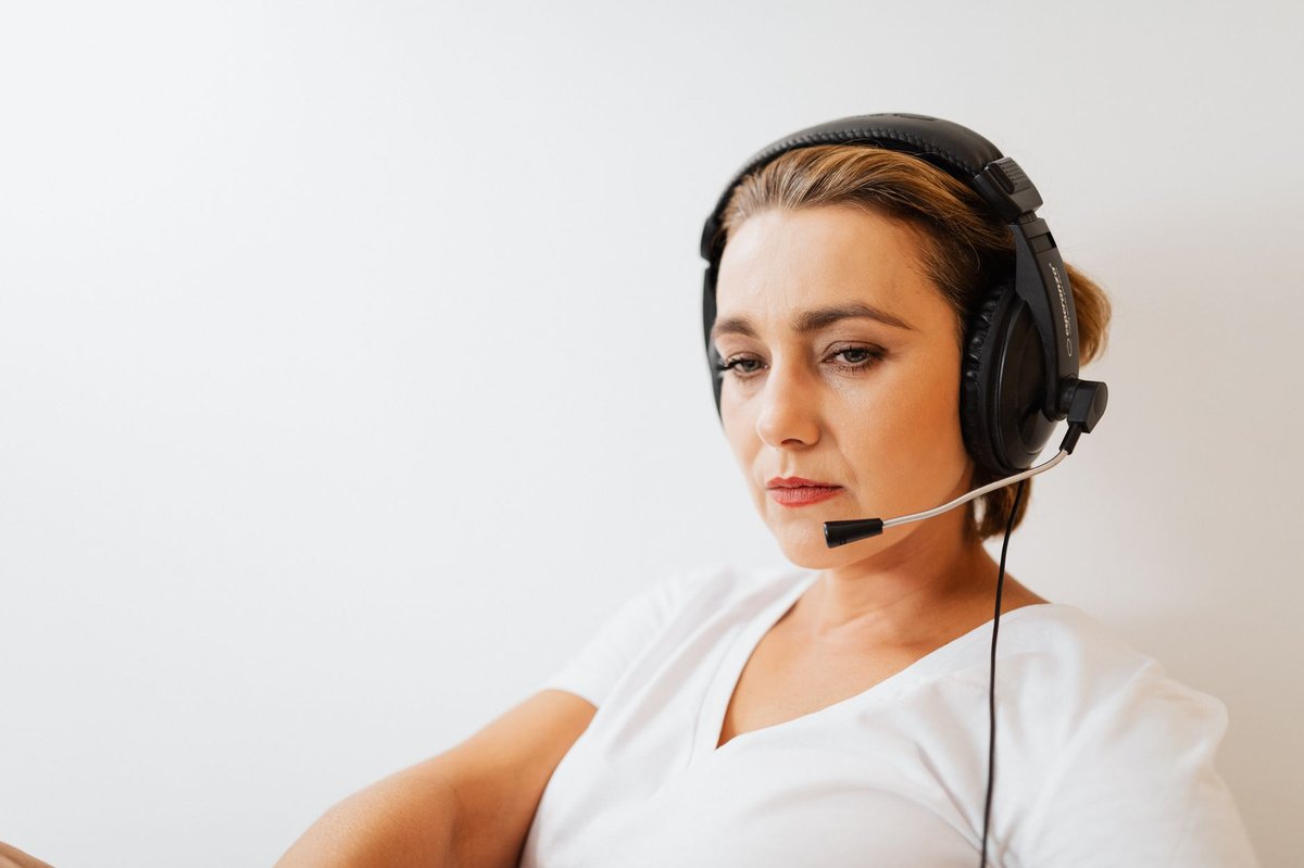 Customer support team member wearing a headset